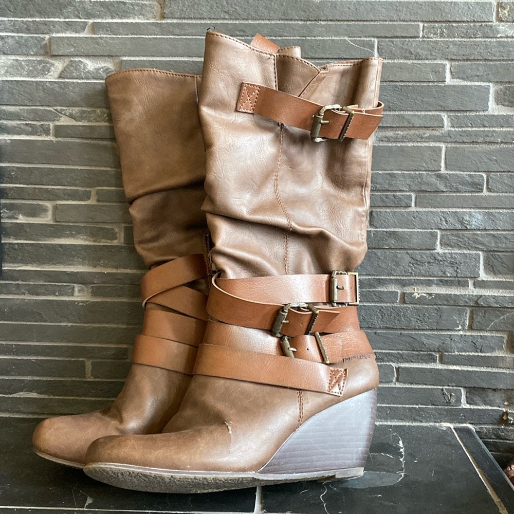 {%} Dark brown calfhigh heeled boots by Blowfish. {%}